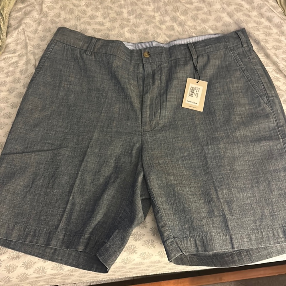 Brand new Peter Millar shorts with an indigo color
